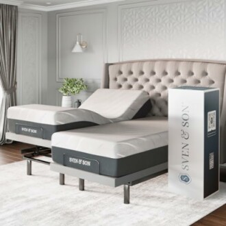 Adjustable bed with Sven & Son branding next to a box in a modern bedroom.