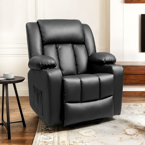 Black leather recliner chair in living room.