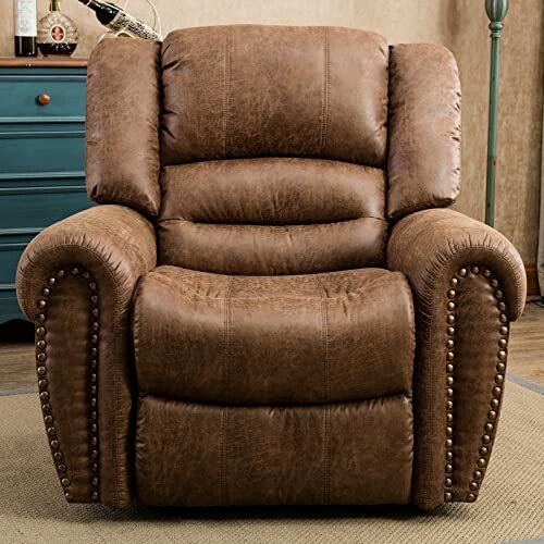 Brown leather recliner chair with nailhead trim